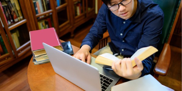 A law librarian updating the library's collection.